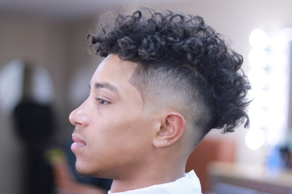 Curly Low Fade with Disconnected Top