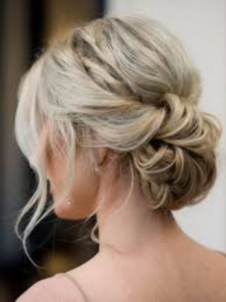Messy Chignon with Loose Strands