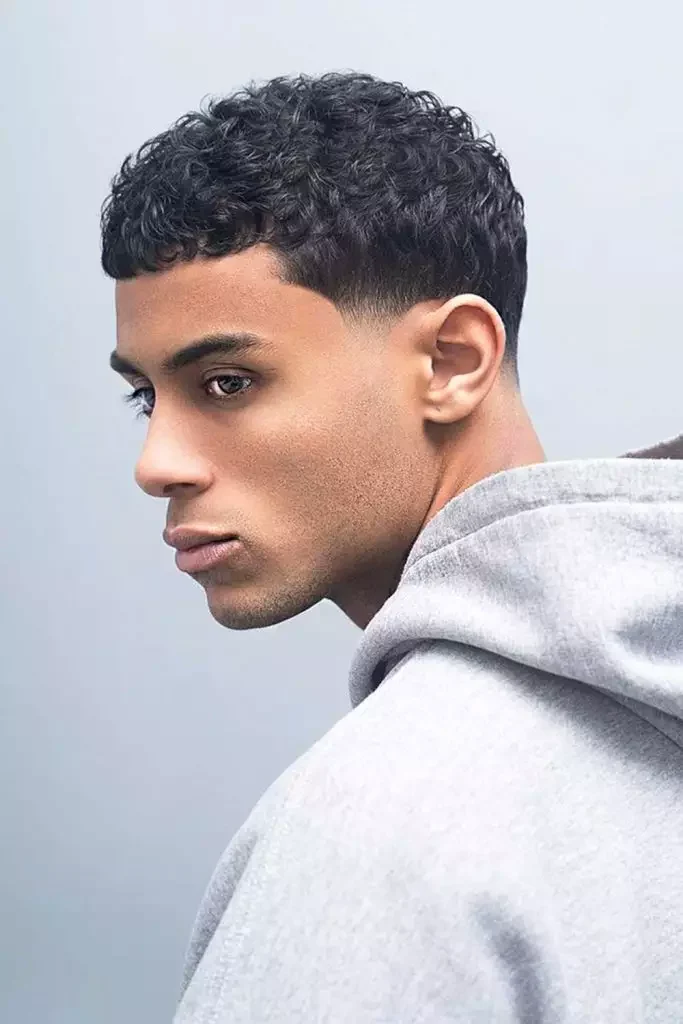 Curly Low Fade with Curls of Low Volume
