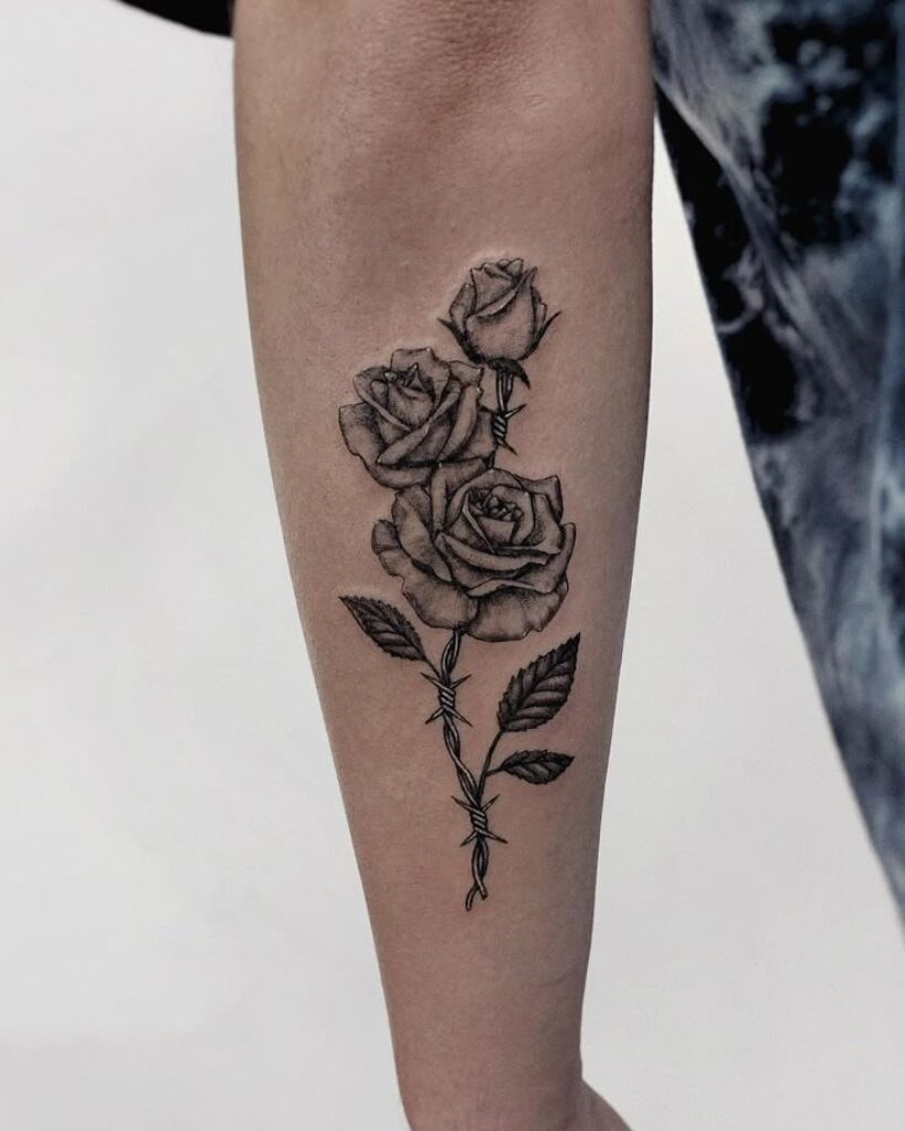 Forearm Rose with Barbed Wire Tattoo men