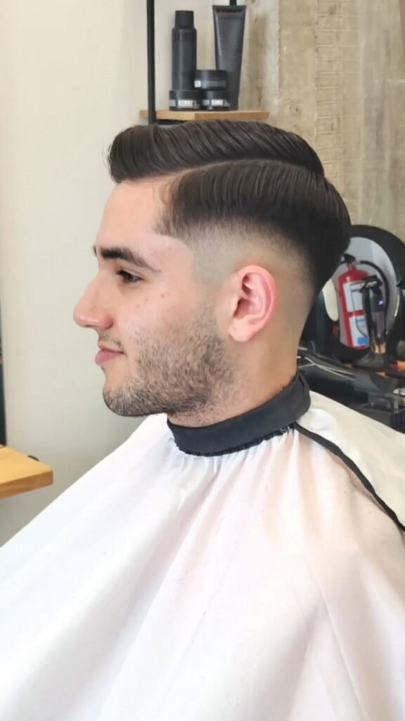 Mid Fade with a Side Part.